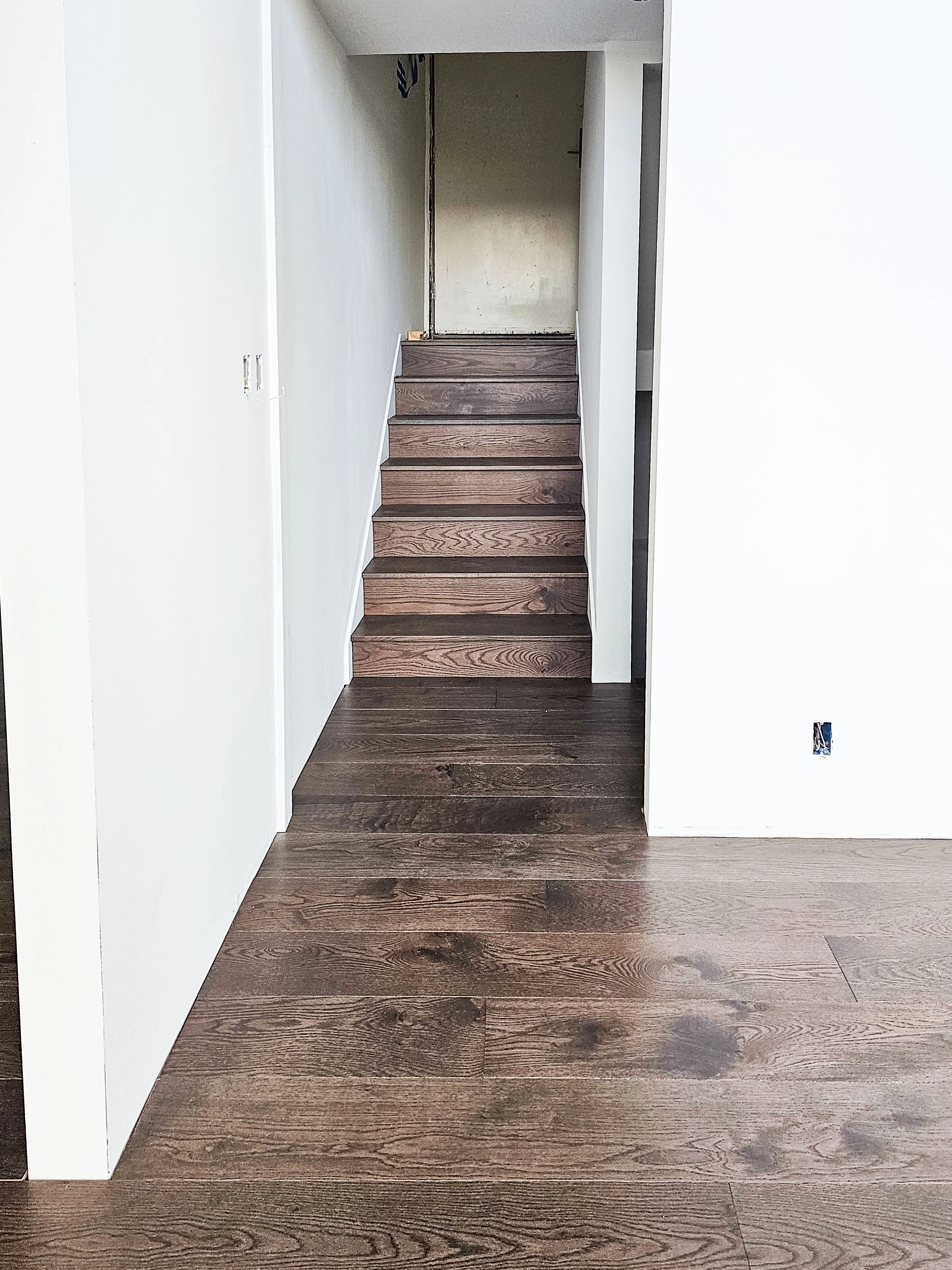 Picture of Alva Flooring installed these prefinished engineered European white oak steps and flooring. - Alva Flooring Inc.