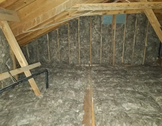 Picture of Attic Bros installed blown-in insulation in this attic. - Attic Bros