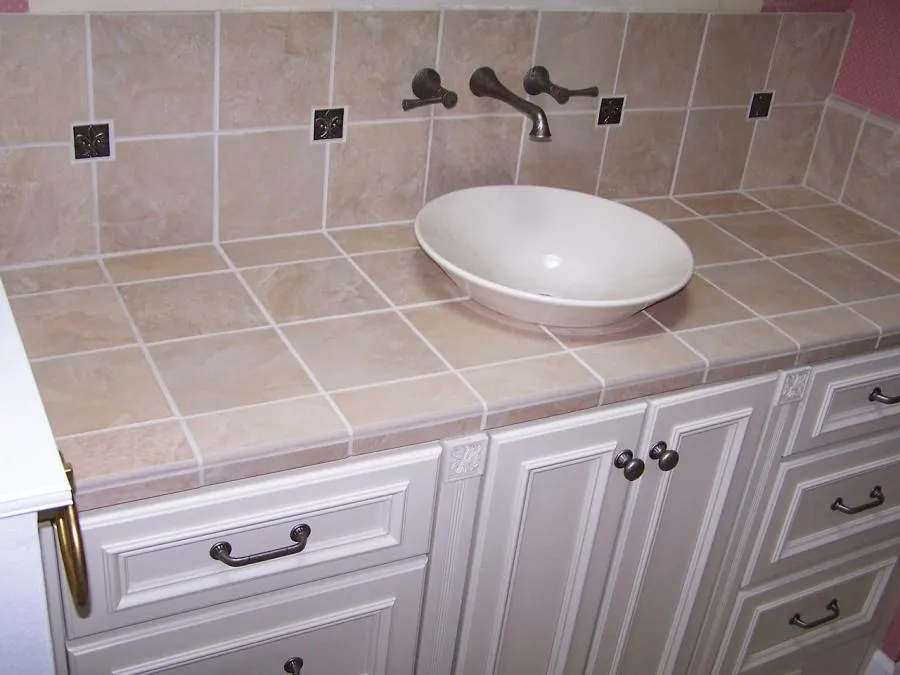 Picture of Custom white painted cabinets tile counter and backsplash. - Labourdette Construction