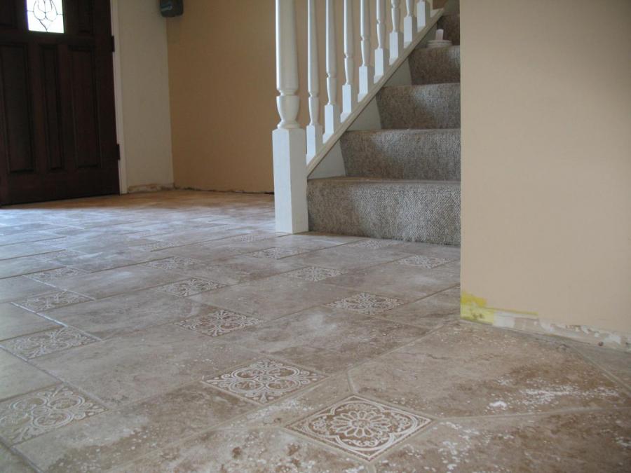 Picture of DC Tile and Stone installed these natural stone-looking ceramic tiles in a client's entryway. - DC Tile and Stone