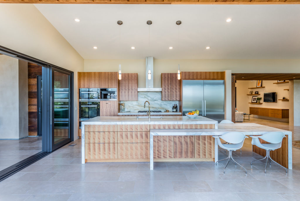 Picture of This kitchen features Miele appliances and marble countertops. - Harkey Construction, Inc.