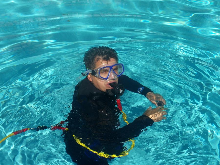 Picture of Its team of SSI-certified divers performs underwater repairs. - The Pool Doctor