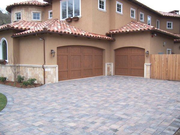 Picture of Custom arched, all-cedar garage doors in Alamo - Madden Door & Sons, Inc.