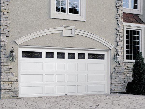 Picture of A Raynor unique-stamped steel garage door in Pleasant Hill - Madden Door & Sons, Inc.