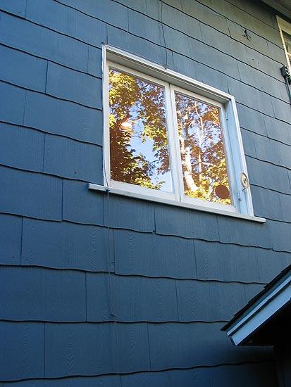 Picture of The company also performs window replacements. - IRC All Siding