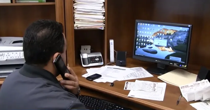 Picture of Owner Alex Ortiz assists a customer over the phone. - Ortiz Heating and Air Conditioning