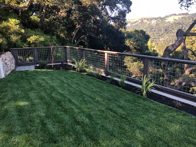 Picture of This hog wire fence makes it possible for the homeowners to still enjoy the view. - A & J Fencing