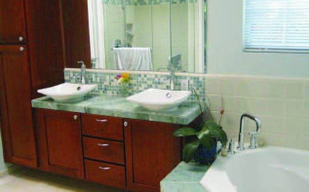 Picture of This bathroom remodel features dual external sink basins. - Custom Cuts Construction Inc. DBA American Kitchen and Bath