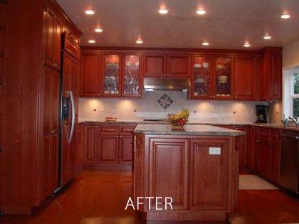 Picture of American Kitchen and Bath installed glass door cabinets in this kitchen. - Custom Cuts Construction Inc. DBA American Kitchen and Bath