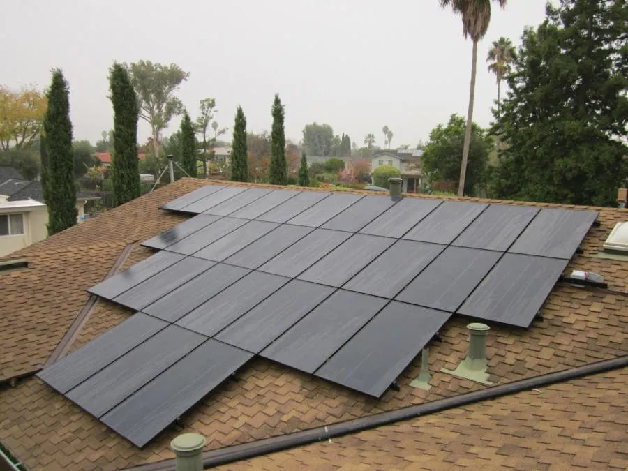 Picture of Black-on-black modules on a composite shingle roof. - Freedom Solar, Inc.