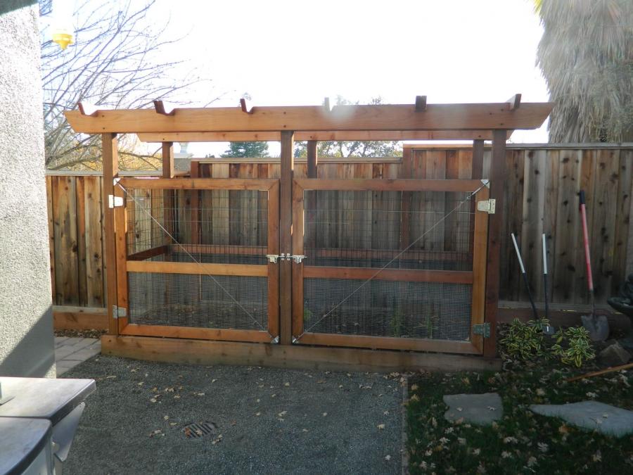 Picture of Devengenzo Landscaping & General Engineering built this deer- and raccoon-resistant redwood garden enclosure. - Devengenzo Landscaping & General Engineering Inc.