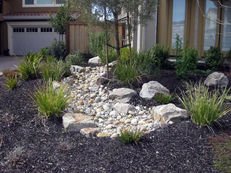 Picture of Dana Lund Landscaping created this dry creek effect in Danville. - Dana Lund Landscaping, LLC