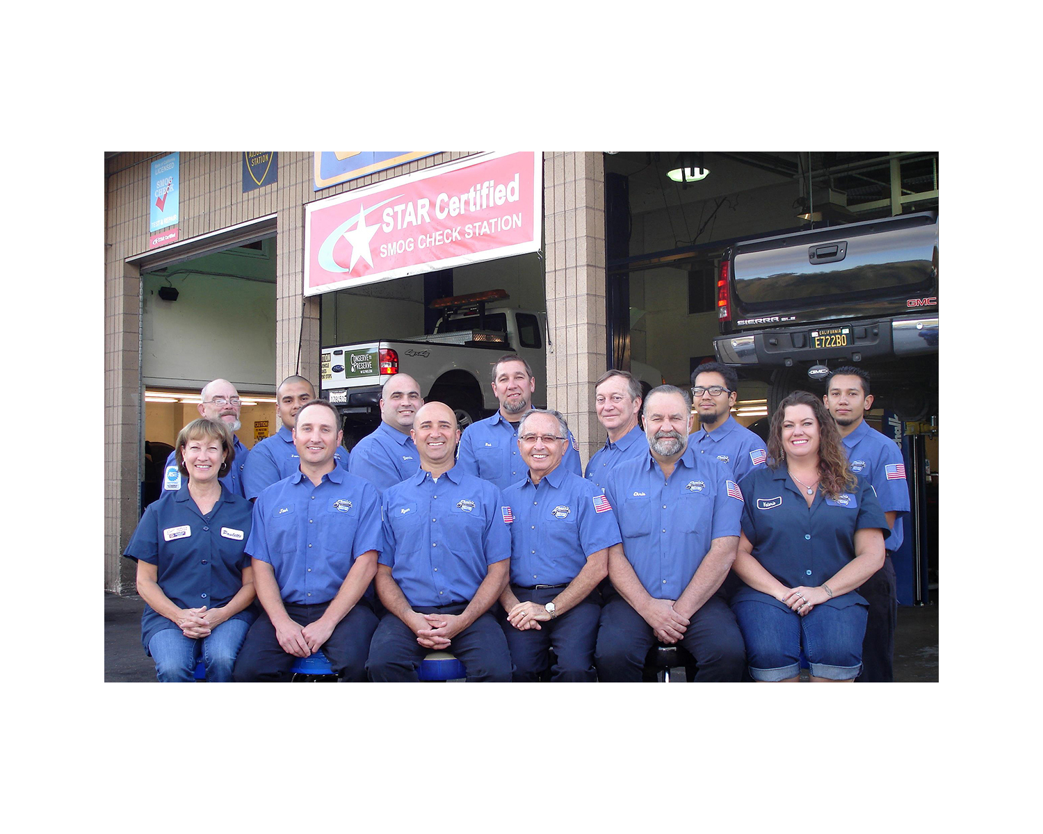 Picture of Ernie’s Service Center’s staff members are committed to serving their community. - Ernie's Service Center