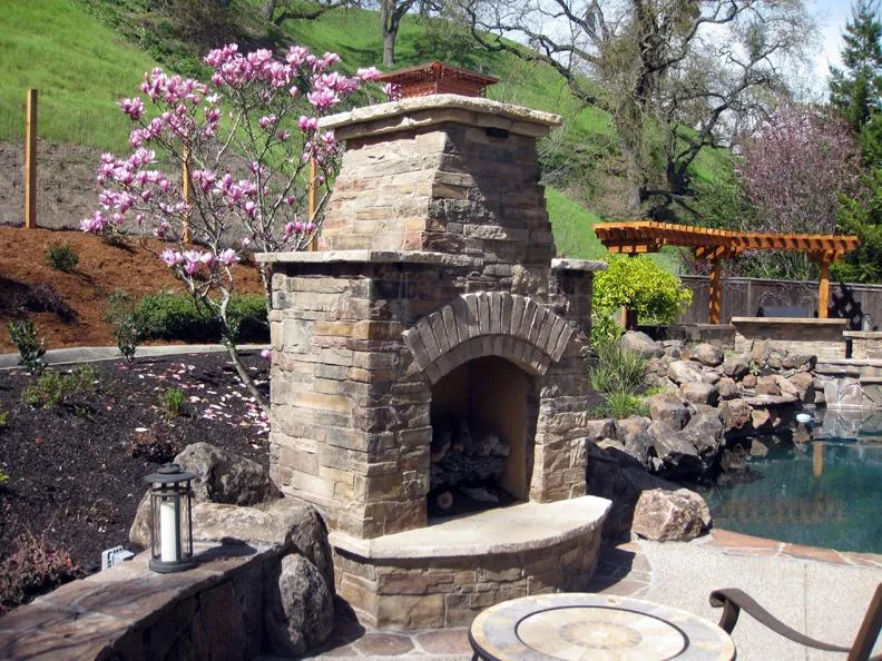 Picture of A custom fireplace in a natural setting in Danville - Dana Lund Landscaping, LLC