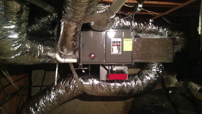 Picture of Haddon Heating & Cooling works on modern, high-efficiency HVAC systems. - Haddon Heating & Cooling