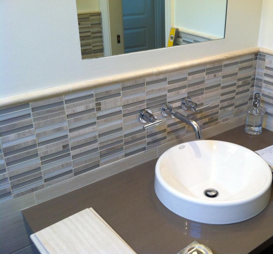 Picture of A granite top vanity with mosaic backsplash - Derrick Tracey Custom Tile & Marble