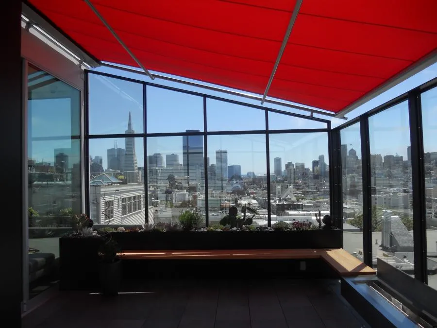 Picture of A motorized retractable conservatory awning on a rooftop in San Francisco - Acme Sunshades Enterprise Inc.