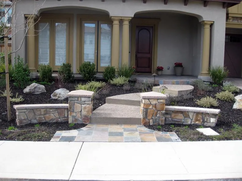 Picture of An exposed aggregate and slate entry in Danville - Dana Lund Landscaping, LLC