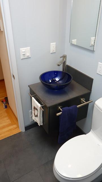 Picture of This bathroom remodeling project features a vessel sink on a wall-mounted vanity. - Brian Fitzmaurice General Contractor