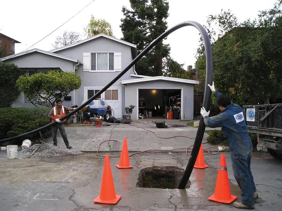 Picture of Pipe Spy Inc.'s crew uses state-of-the-art trenchless technology to replace clay pipes with HDPE pipes. - Pipe Spy Inc.