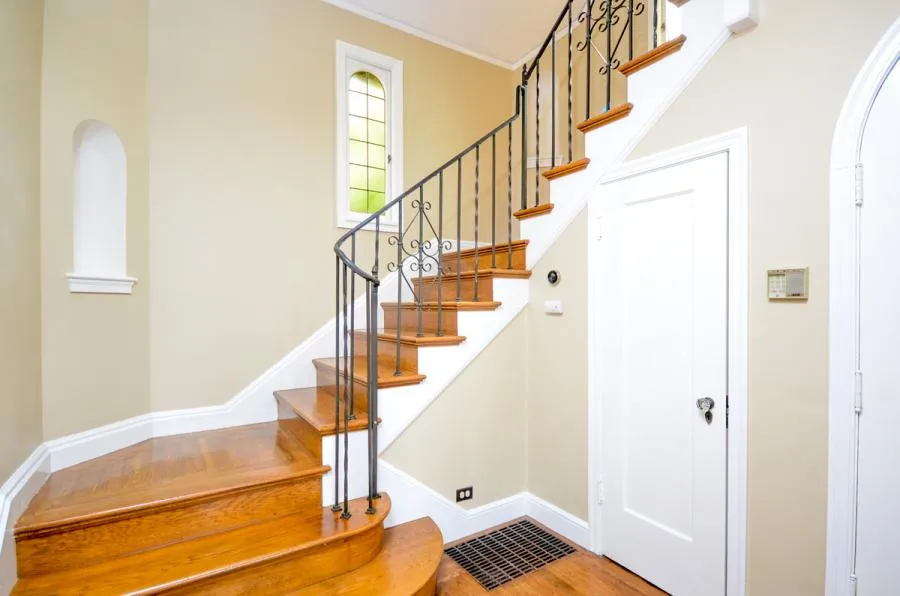 Picture of Home Healing Renovations built this hardwood staircase with iron rails in a client's North Berkeley home. - Home Healing Renovations, Inc.