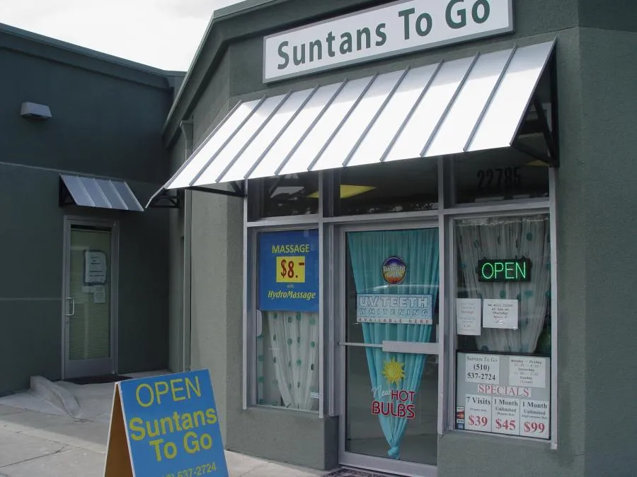 Picture of Acme Sunshades Enterprise installed this standing seam metal awning on a storefront in Hayward. - Acme Sunshades Enterprise Inc.