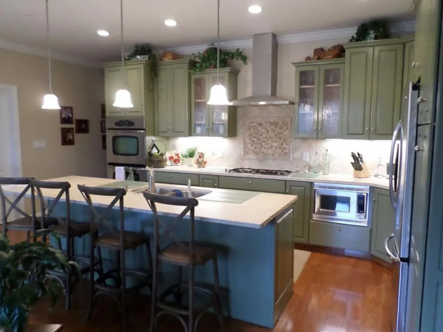 Picture of These limestone countertops have embedded fossils that diners can look at while they eat. - Thompson Construction, Inc.