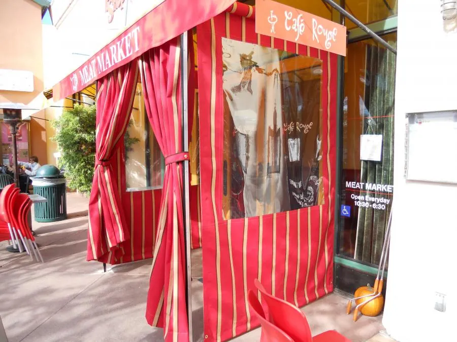 Picture of This Berkeley restaurant features vertical drop roller curtains and clear vinyl windows. - Acme Sunshades Enterprise Inc.