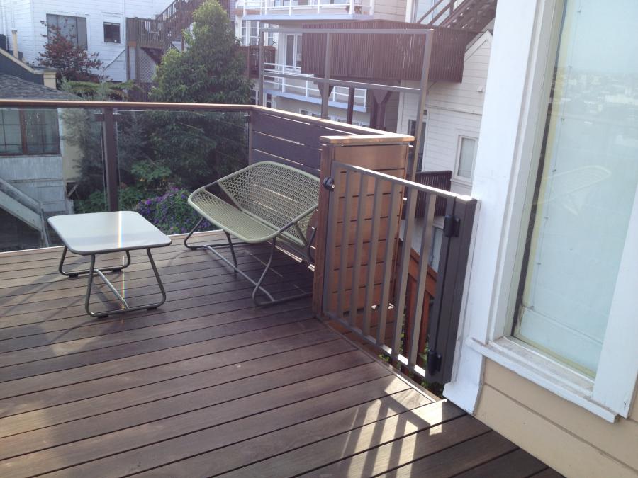 Picture of Spryscapes Construction installed this gate on a client’s deck. - Spryscapes Construction, Inc.