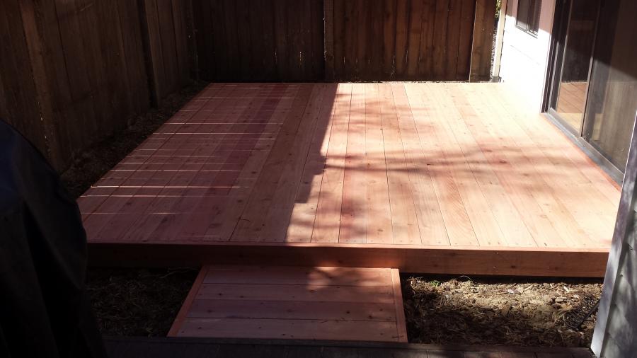 Picture of Willow Creek Construction built this pressure-treated redwood deck. - Willow Creek Construction