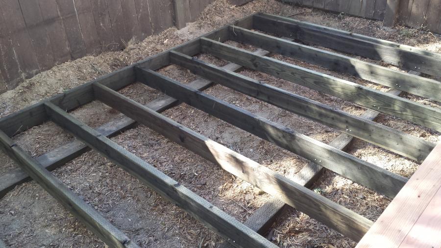 Picture of A look at the joists and beams that support this deck - Willow Creek Construction