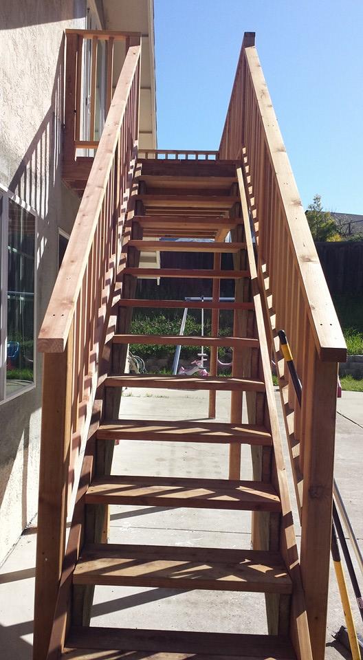 Picture of These redwood stairs lead to an office converted from an attic. - Willow Creek Construction