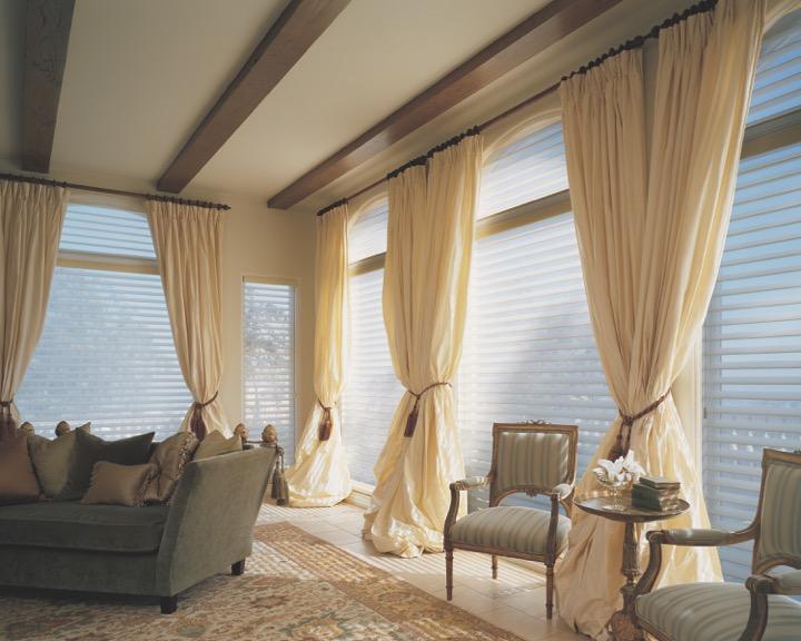 Picture of This room features Silhouette shades with side panels and an area rug. - PKS Interiors