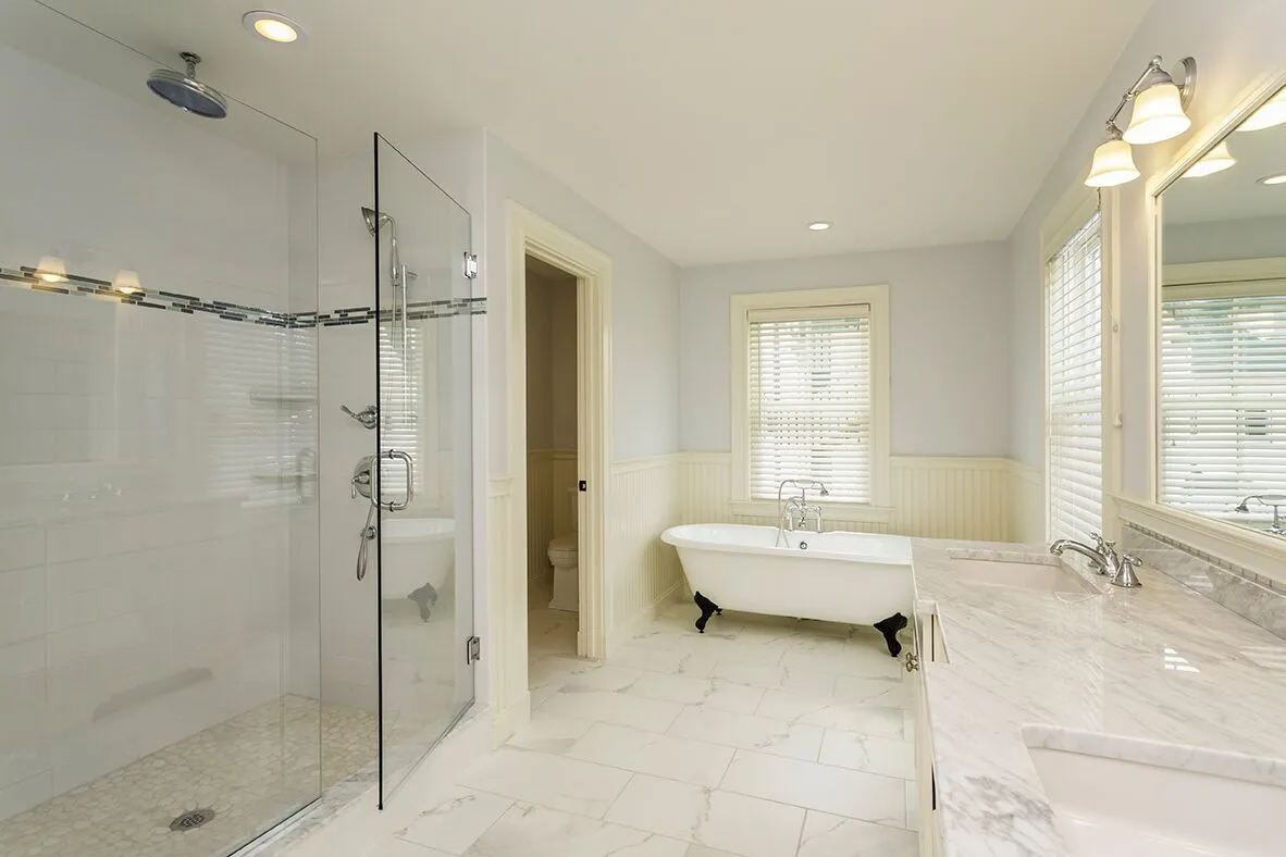 Picture of This custom frameless shower door was designed to make the bathroom feel larger. - Schicker Luxury Shower Doors, Inc.