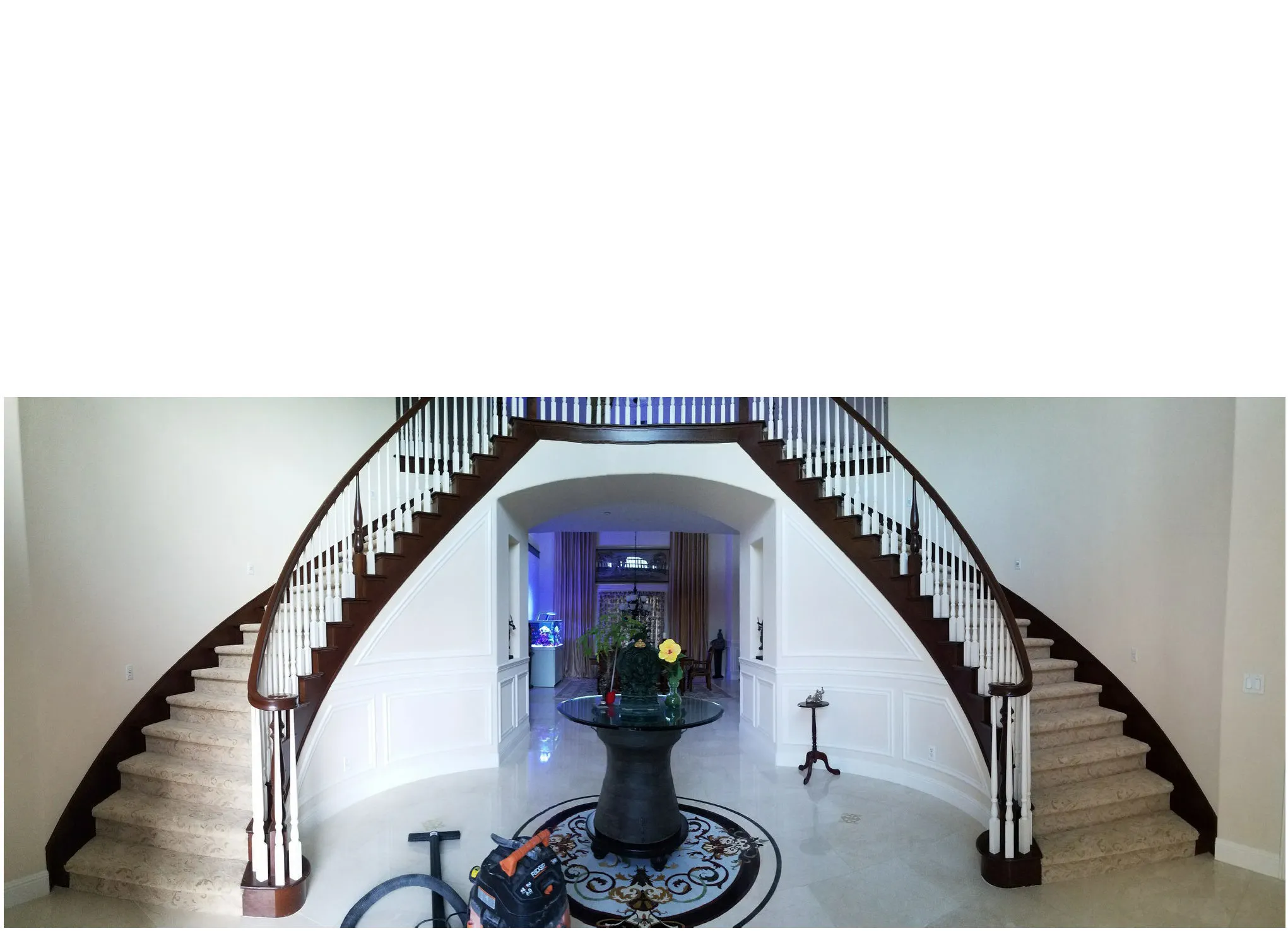 Picture of Carpeteria installed the carpeting on this double staircase. - Carpeteria