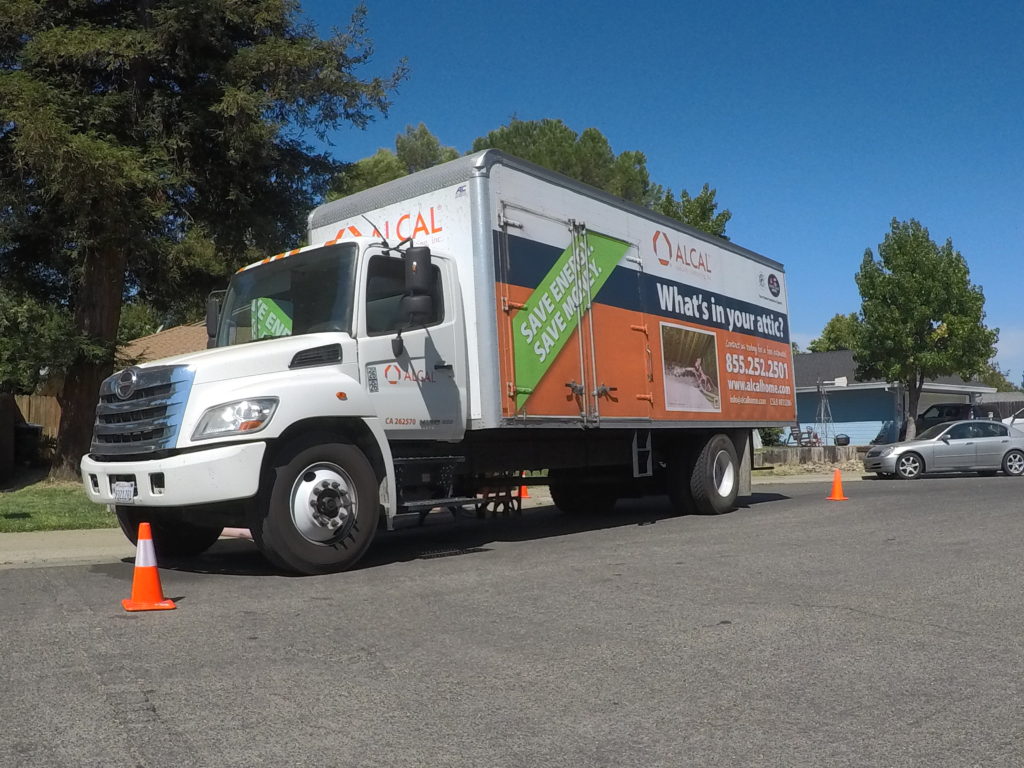 Picture of One of Alcal Specialty Contracting's service trucks outside of a client's residence - Alcal Specialty Contracting, Inc.