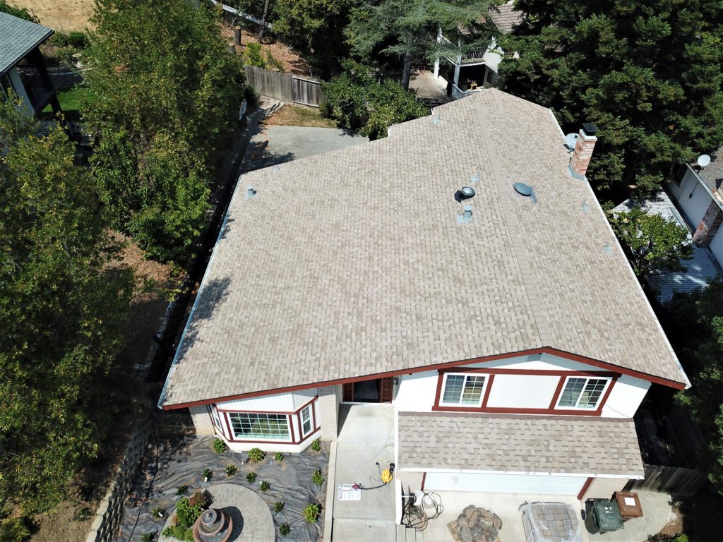 Picture of PRI-Premiere Roofing installed this salt box pitched roof. - PRI-Premiere Roofing Inc.