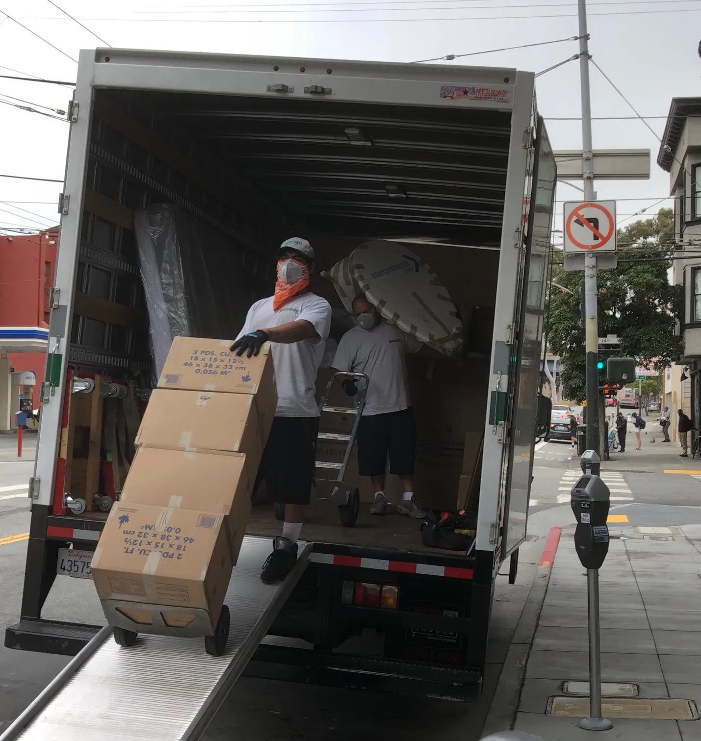 Picture of A and P Moving technicians carefully move a customer's belongings into a truck. - A and P Moving, Inc.