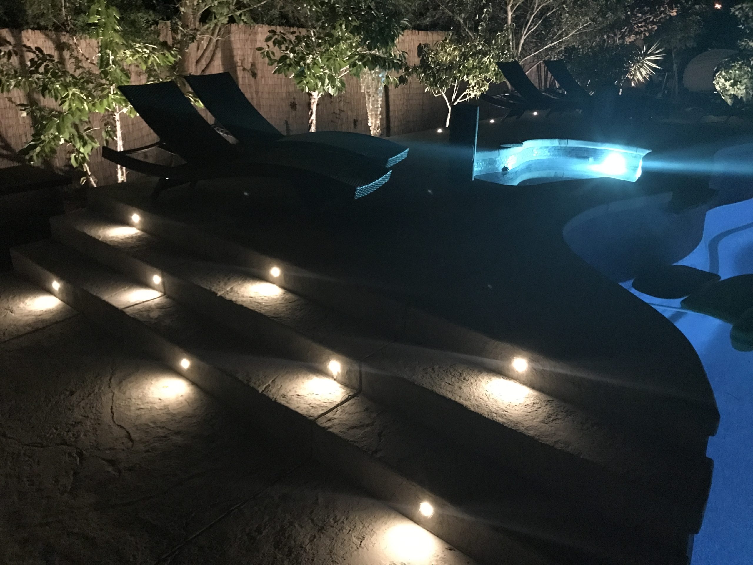 Picture of Pro City Electric installed lighting on these concrete pool stairs. - Pro City Electric, Inc.