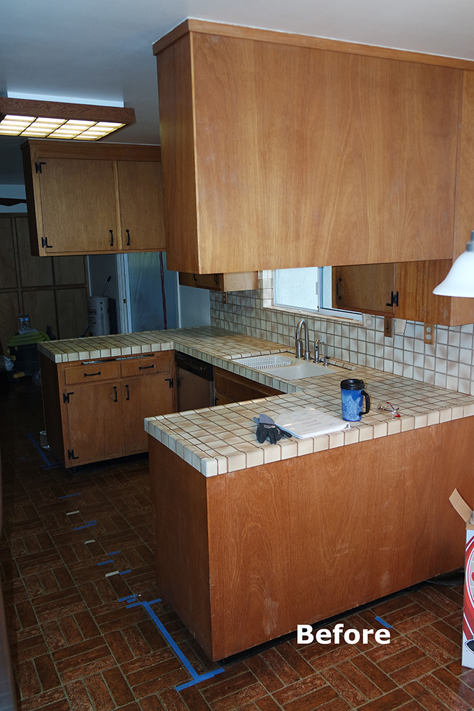 Picture of The kitchen in this ranch-style home was the original layout complete with hanging cabinets that closed in the space. - Cook's Kitchen & Bath, Inc.