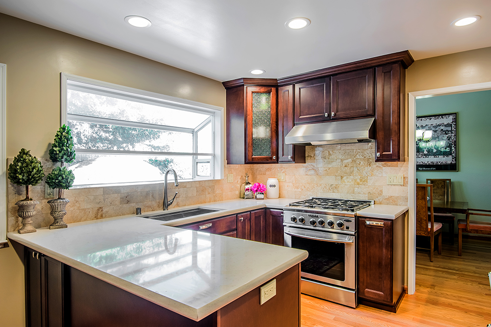 Picture of The owner of this Martinez kitchen wanted everything to be made new. With almost no changes to the layout Cook's Kitchen & Bath simply refreshed and updated everything. The cabinets are maple from Hun - Cook's Kitchen & Bath, Inc.