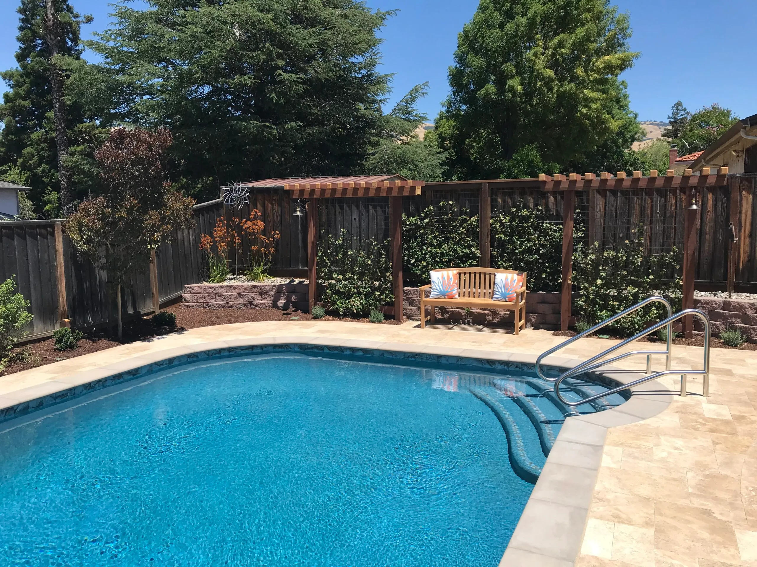 Picture of AFTER: Koch & Associates installed new pool coping tile and plaster as well as a new pool deck and sitting area. - Koch & Associates, Inc.