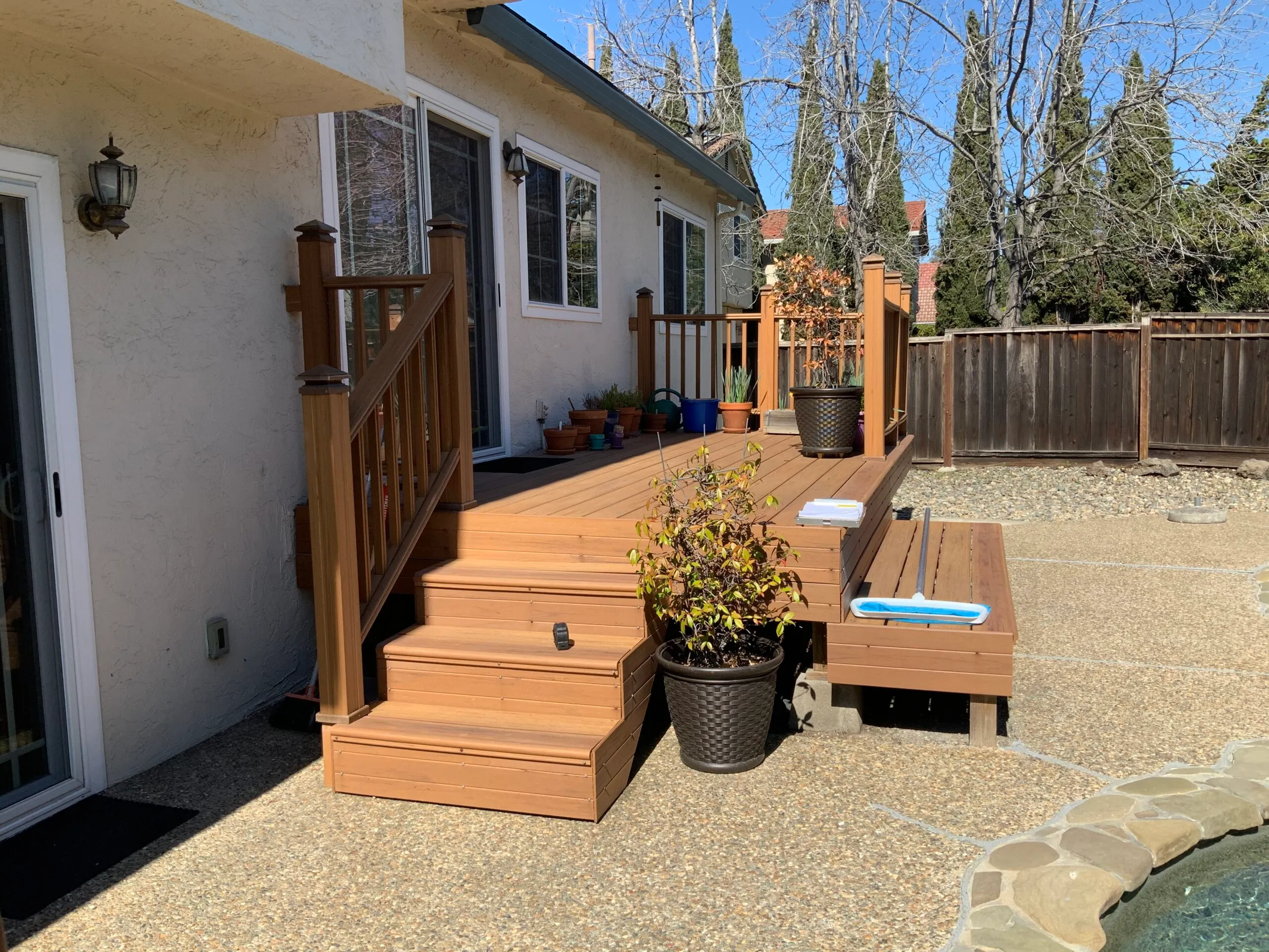 Picture of BEFORE: This deck wasn't providing usable space and the client wanted a shady space by the pool. - Koch & Associates, Inc.