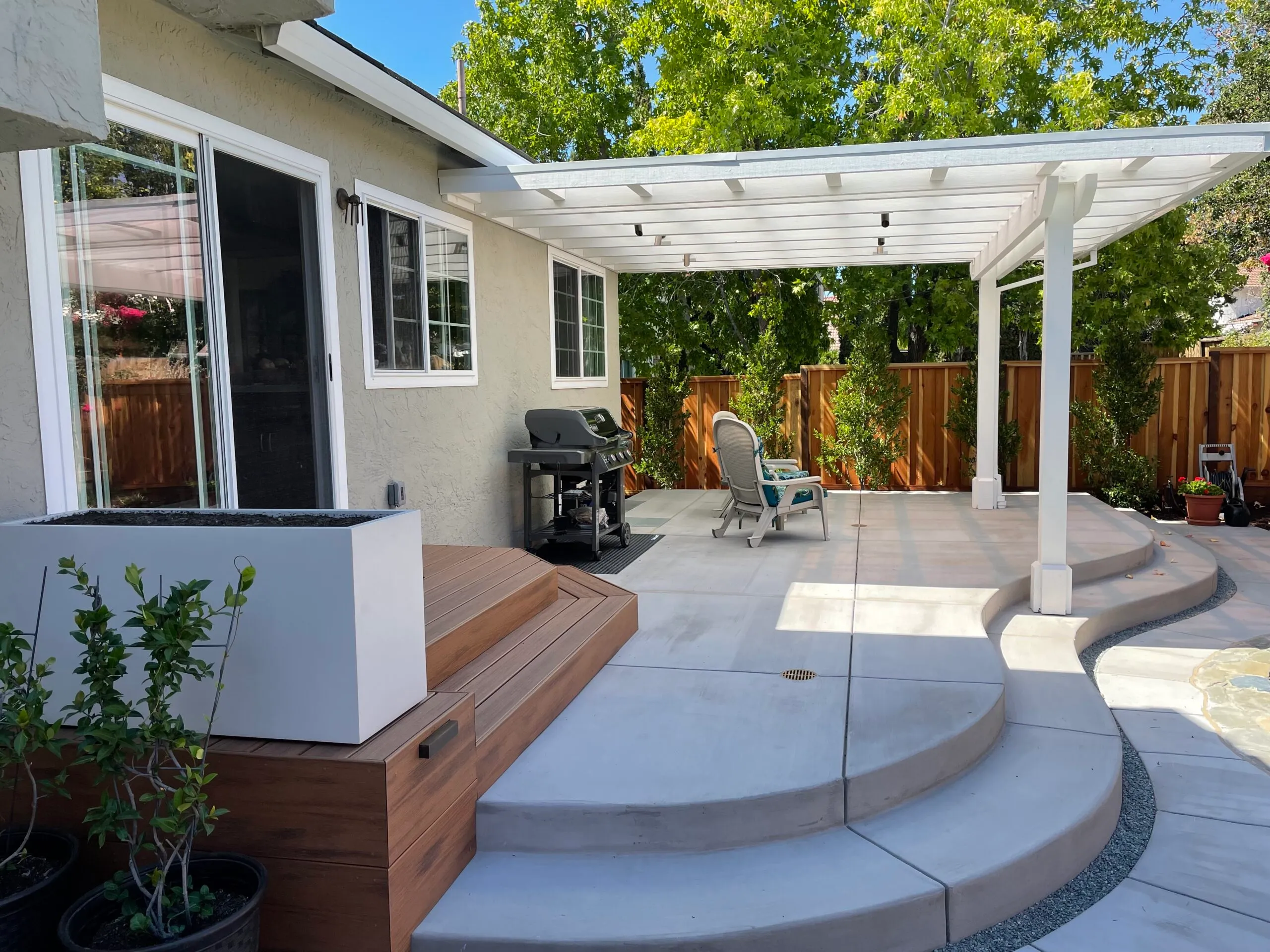 Picture of AFTER: Koch & Associates created this usable patio space with a shade structure only two steps away from the home. - Koch & Associates, Inc.