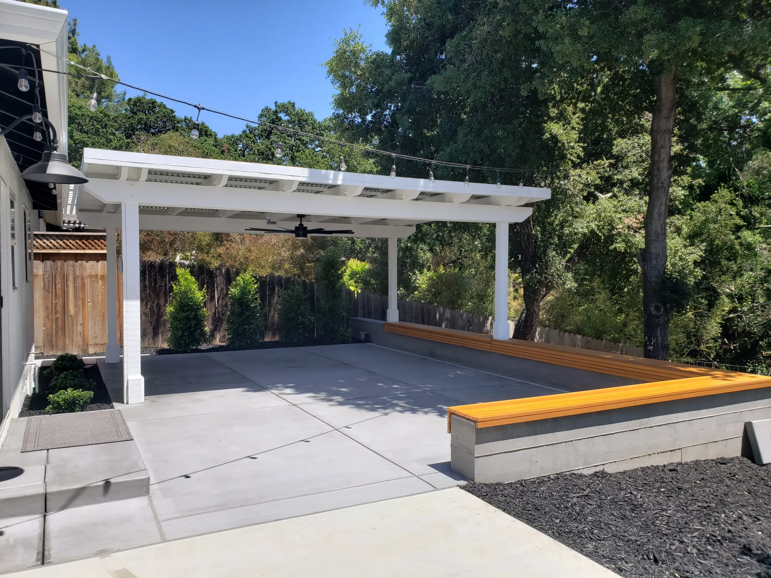 Picture of AFTER: Koch & Associates built this large patio with a covered arbor/pergola and seat walls for lots of entertaining. - Koch & Associates, Inc.