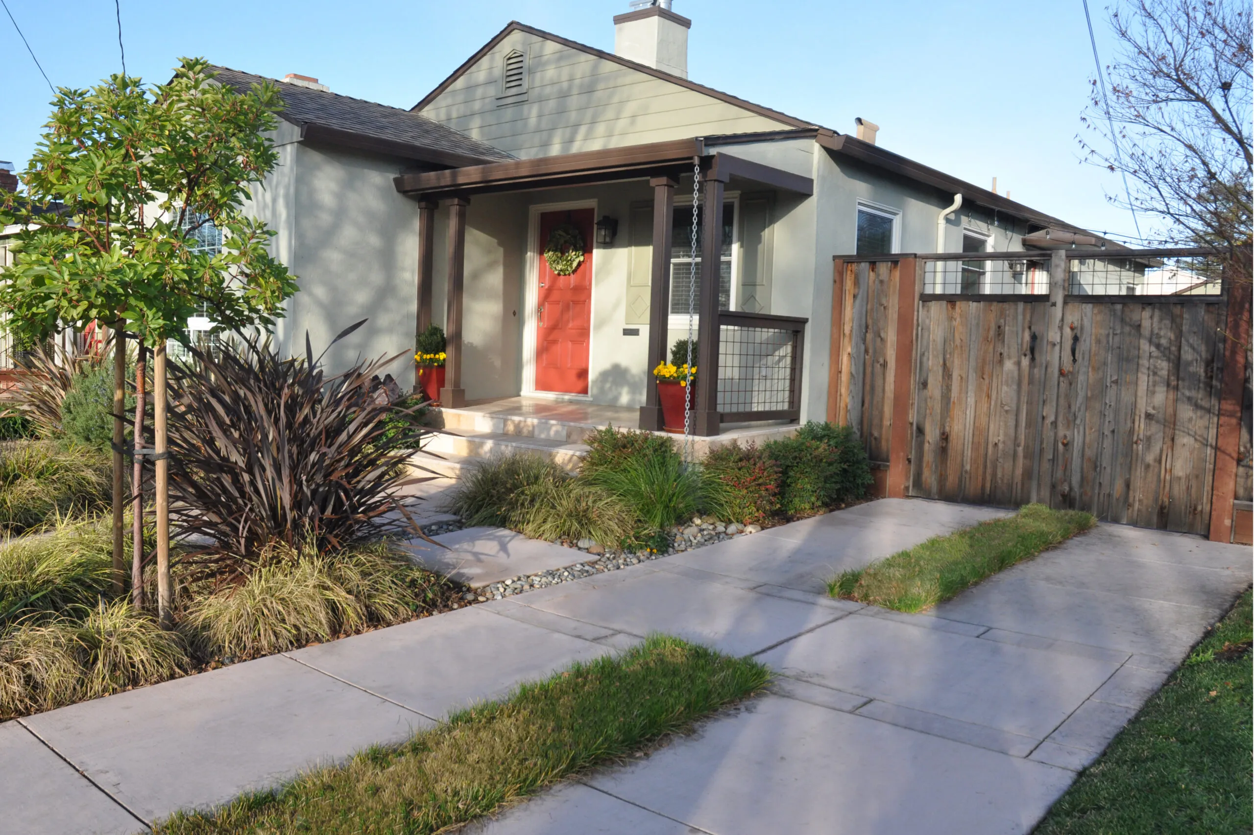 Picture of This house didn't have a front lawn which means there was plenty of space for drought-tolerant plants. - Koch & Associates, Inc.