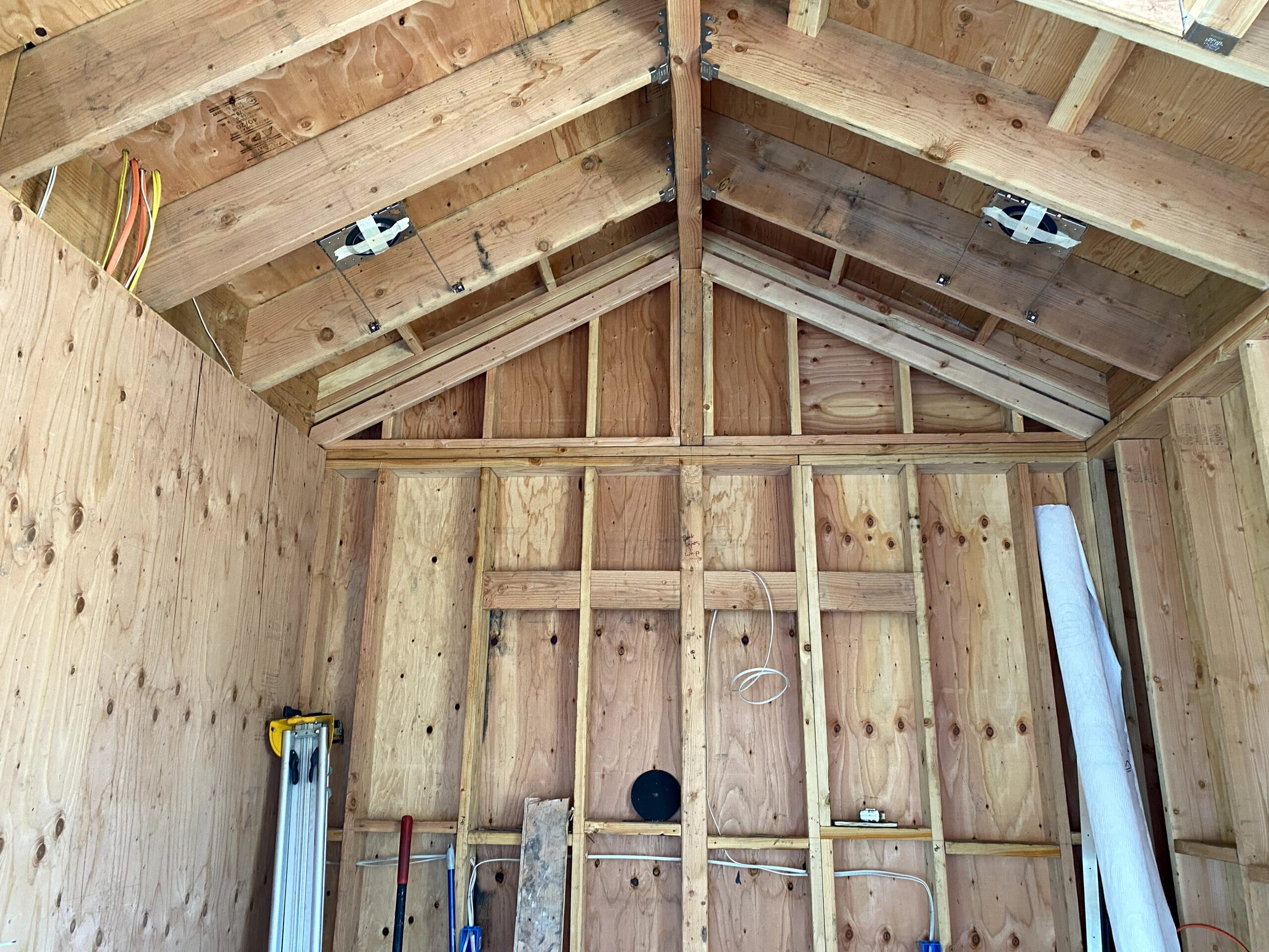 Picture of A look at the wiring work inside the frame of a recent remodeling project by Green Living Builders - Green Living Builders LLC