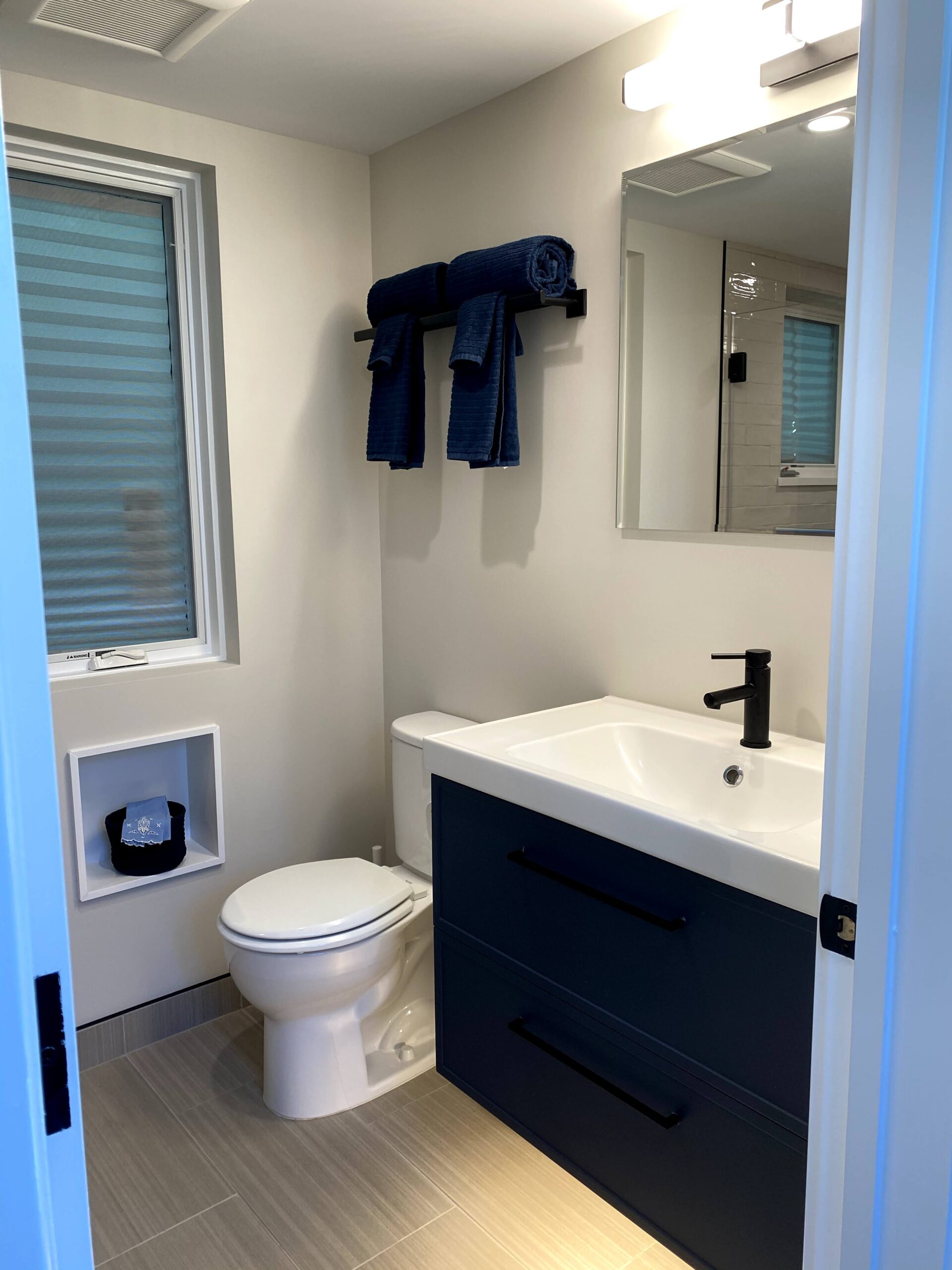 Picture of Green Living Builders remodeled this bathroom to add extra storage space. - Green Living Builders LLC