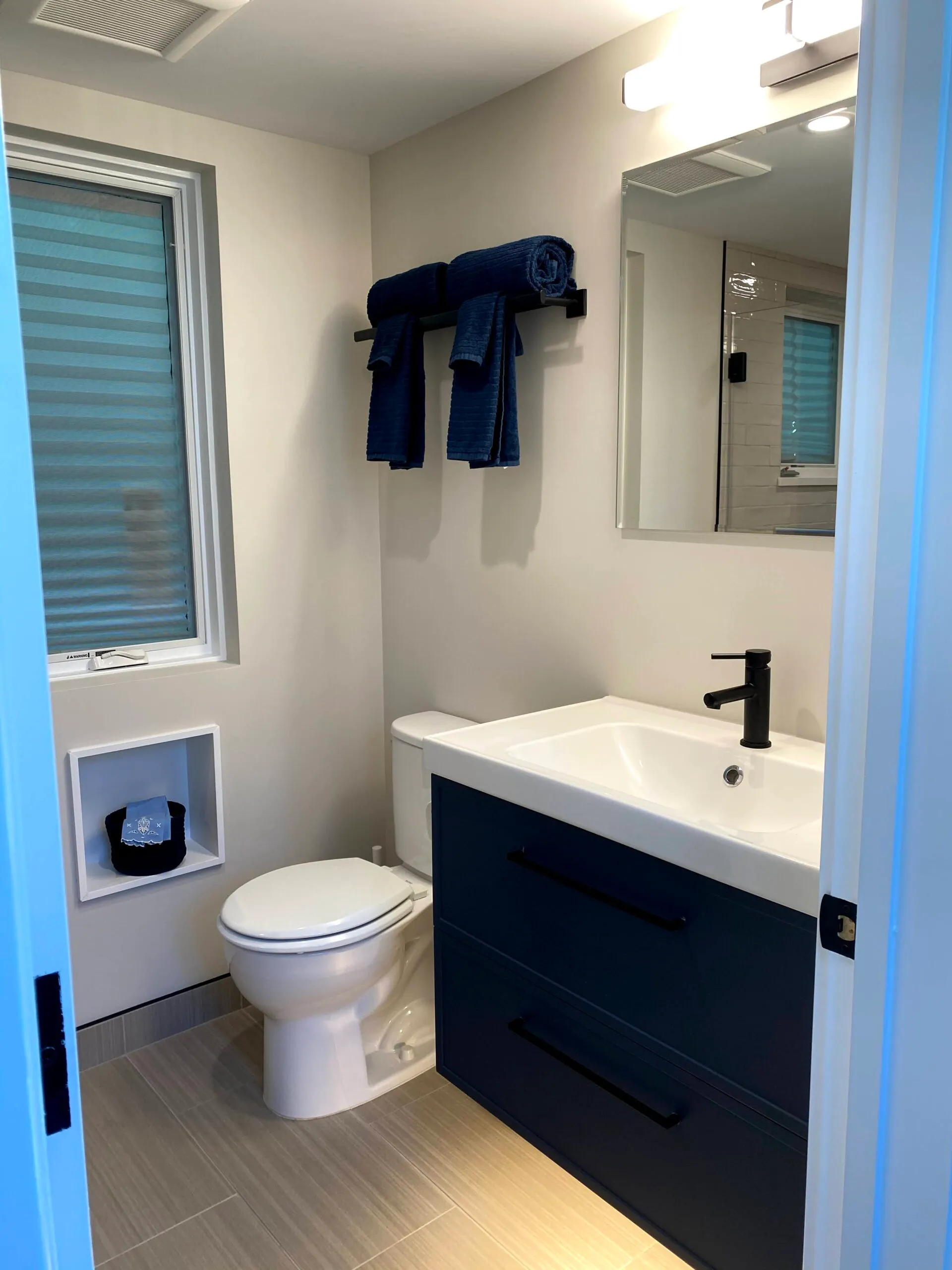 Picture of Green Living Builders remodeled this bathroom to add extra storage space. - Green Living Builders LLC