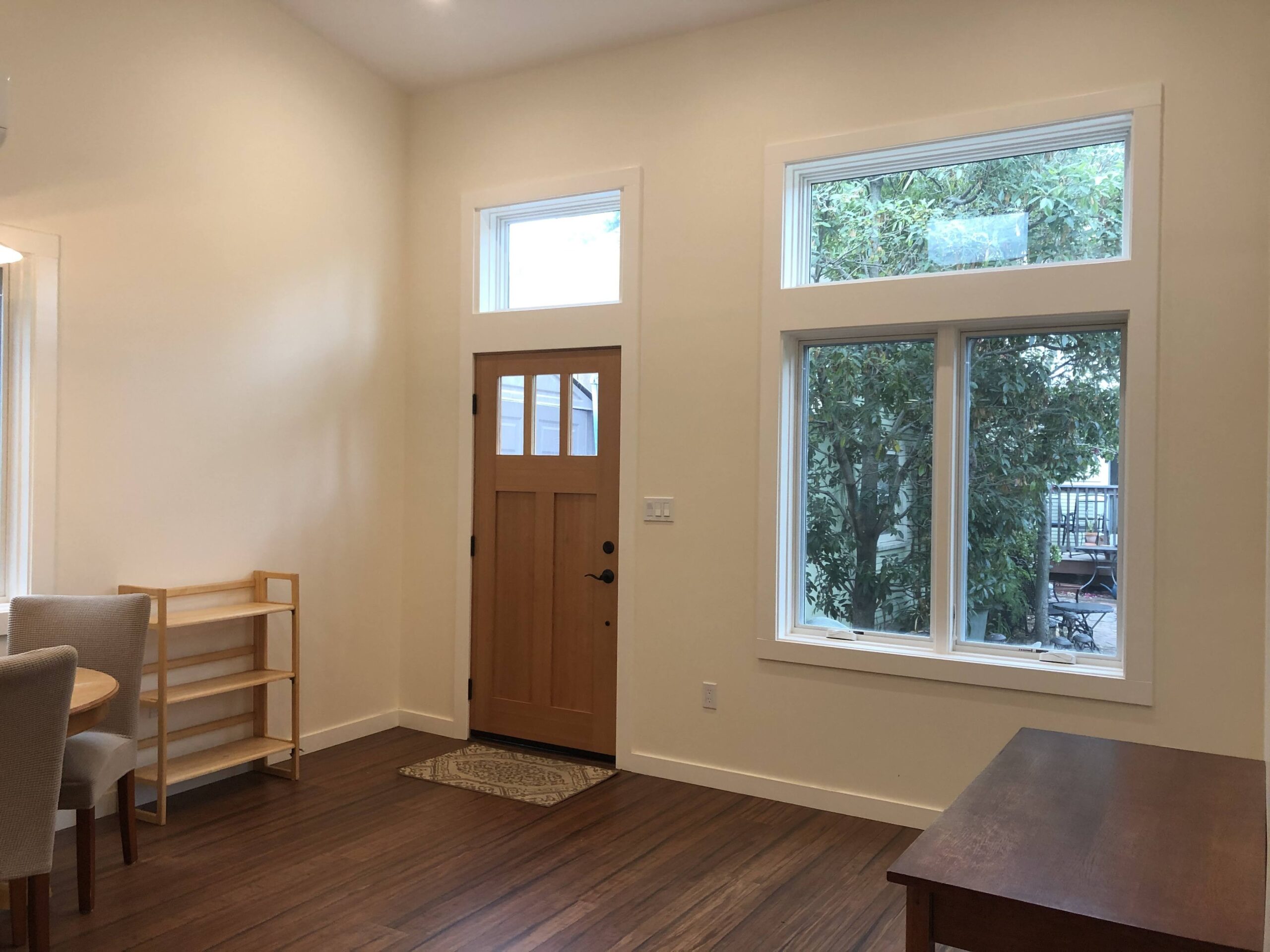 Picture of Green Living Builders transformed this living space by installing windows to bring in more light. - Green Living Builders LLC